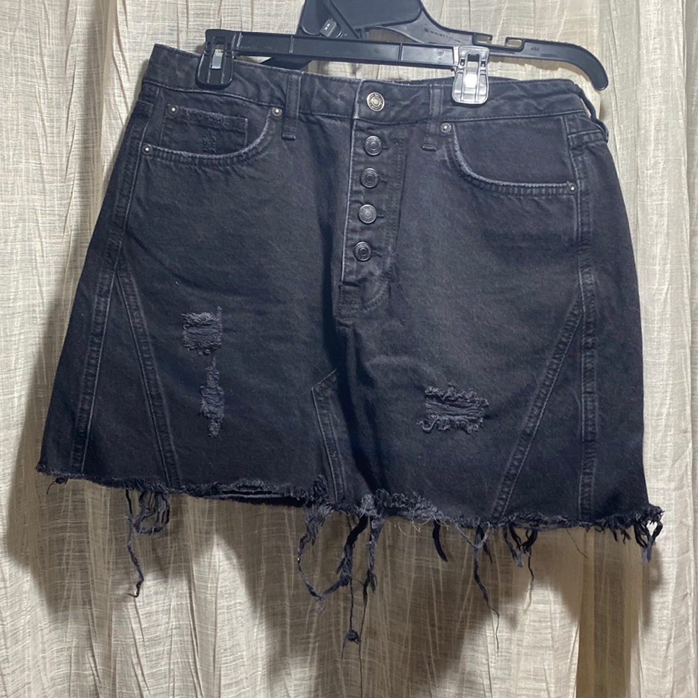 Black high waisted ripped denim skirt